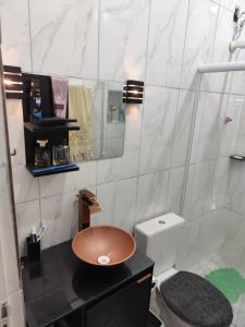 Phòng tắm tại Casa dos pássaros