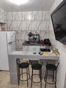 Nhà bếp/bếp nhỏ tại Casa dos pássaros