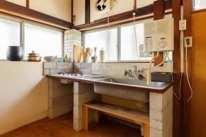 Køkken eller tekøkken på 腰越小動の宿 + 33 billeder