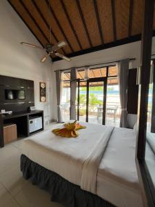Ένα ή περισσότερα κρεβάτια σε δωμάτιο στο Tropica Gili Hotel - Gym & Recovery Spa +18 φωτογραφίες