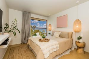 Ένα ή περισσότερα κρεβάτια σε δωμάτιο στο Cantilever Seaview Pavilion +49 φωτογραφίες