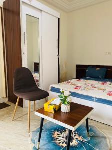 Postel nebo postele na pokoji v ubytování RESIDENCE EL HADJI