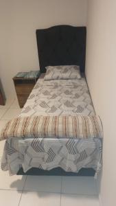 Postel nebo postele na pokoji v ubytování Sossego1