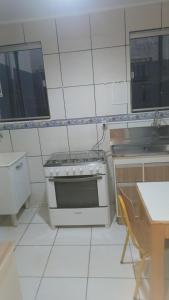 Kuchyň nebo kuchyňský kout v ubytování Sossego1 + 1 fotografie