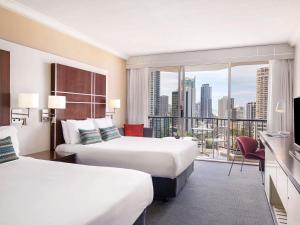 Postel nebo postele na pokoji v ubytování Mantra on View