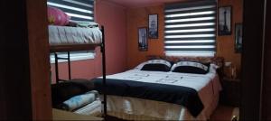 Кровать или кровати в номере Casa hermosa en la playa