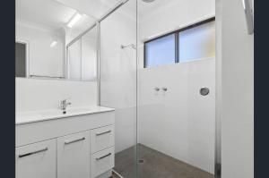 Ванная комната в Coastal Comfort Sandcastles 221