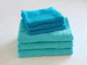 a stack of towels sitting on a table at VOGUE D, a private inn with a panoramic view - Vacation STAY 86199v in Isumi +52 photos