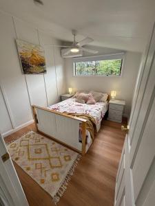 Ένα ή περισσότερα κρεβάτια σε δωμάτιο στο Bunya Cottage