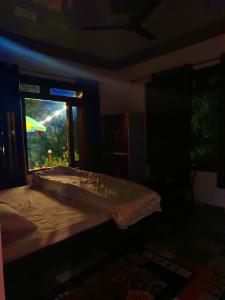 Postel nebo postele na pokoji v ubytování A Home Above the Clouds Riturain Mukteshwar + 13 fotografií