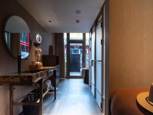 Η κουζίνα ή μικρή κουζίνα στο Hutong Mòlì Hotel