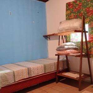 Ένα ή περισσότερα κρεβάτια σε δωμάτιο στο Hospedaria da Lua hostel