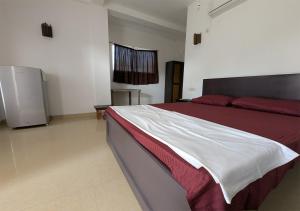 Ένα ή περισσότερα κρεβάτια σε δωμάτιο στο Tatyana House