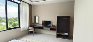 Μια τηλεόραση ή/και κέντρο ψυχαγωγίας στο Sunriver Hotel