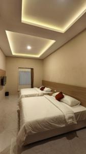 Ένα ή περισσότερα κρεβάτια σε δωμάτιο στο Sunriver Hotel