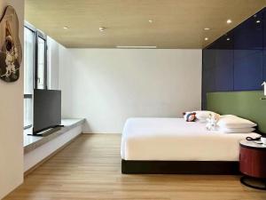 Postel nebo postele na pokoji v ubytování Atour Mansion Shanghai City Center