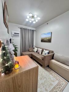 O zonă de relaxare la Budget Condo HomeStay at Soleia Manors Butuan City Free Parking