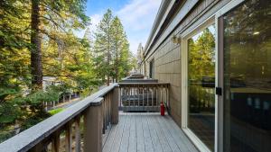 a balcony with a red fire hydrant on a building at Cozy Forest Hideaway in Incline Village Private Balcony Sierra Solace by AvantStay in Incline Village