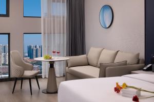 Un lugar para sentarse en Huanman Hotel Jishou State Government Branch