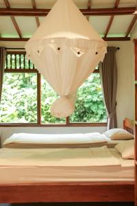 Postel nebo postele na pokoji v ubytování Hyori Boutique Homestay