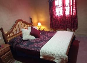 Giường trong phòng chung tại Finca El Legado