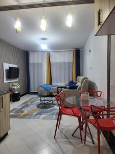 Телевизор и/или развлекательный центр в GG PREMIUM Ngala 3br Five Beds