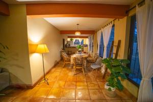 a dining room with a table and chairs at Large family house in Cabo , pet friendly in Cabo San Lucas