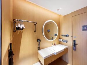 Phòng tắm tại JI Hotel Shenzhen Guangming Time Valley +48 ảnh