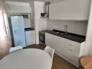 Nhà bếp/bếp nhỏ tại Moderno apartamento a metros de 18 de Julio +20 ảnh