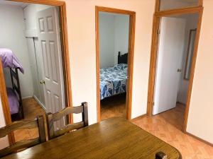 Ένα ή περισσότερα κρεβάτια σε δωμάτιο στο Cabaña La Serena con Estacionamiento privado