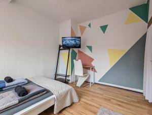 Телевизор и/или развлекательный центр в Cozy Apartment in The Black Forest