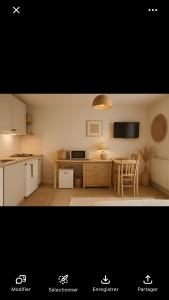 eine Küche mit Tisch und Esszimmer in der Unterkunft Studio 7 in Balaruc-les-Bains