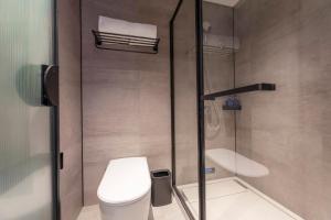 Koupelna v ubytování Hanting Hotel Suzhou Gusu Yungu Changjing Subway Station