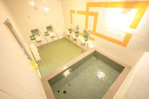 Koupelna v ubytování ロッジＴＯＮＢＯ・石打 + 30 fotografií