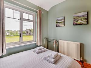En eller flere senge i et værelse på 3 Bed in Hawkshead oc-llh48