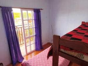 Ένα ή περισσότερα κρεβάτια σε δωμάτιο στο Complejo Berazategui 24