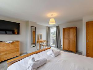 En eller flere senge i et værelse på 4 Bed in Alnwick oc-89964