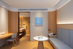 Et opholdsområde på JI Hotel Nanjing Jiangbei High-tech Medical Valley Taifeng Road + 26 billeder