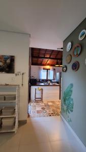 Ένα ή περισσότερα κρεβάτια σε δωμάτιο στο Casa Arraial Ajuda Jardim da Mata +14 φωτογραφίες