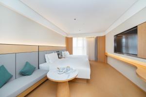 Μια τηλεόραση ή/και κέντρο ψυχαγωγίας στο JI Hotel Nanjing Jiangning Jiaotong University Subway Station