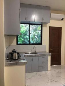 Køkken eller tekøkken på Rey's Pension House- Family Room