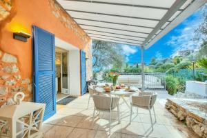 En balkon eller terrasse på Villa Marinella, Style History Serenity