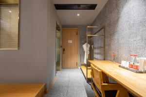 Fotografie z fotogalerie ubytování Huazhu Luxury Wuzhen Mushe Shiguang Hot Spring B&B v destinaci Ťia-sing