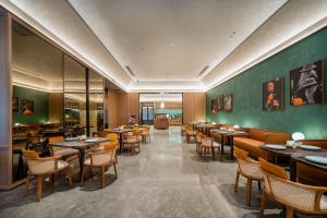 Posezení v ubytování Orange Hotel Suzhou Dushu Lake Moon Bay Subway Station