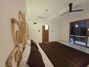 Postel nebo postele na pokoji v ubytování Bunky Monkey by Monara