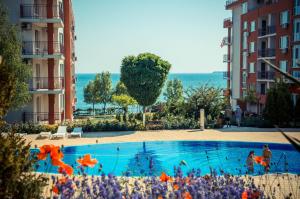 The swimming pool at or close to GT Marina & Panorama Fort Beach Apartments