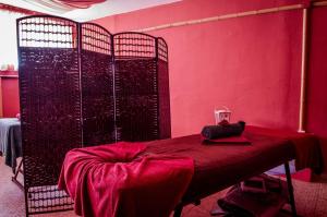 A bed or beds in a room at GT Marina & Panorama Fort Beach Apartments