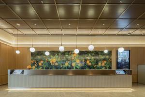 Fotografie z fotogalerie ubytování Orange Hotel Suzhou Dushu Lake Moon Bay Subway Station v destinaci Su-čou