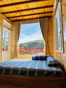 Postel nebo postele na pokoji v ubytování Lưng Đồi Homestay