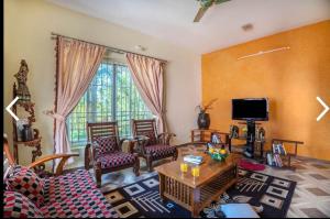 TV a/nebo společenská místnost v ubytování MOUNTAIN OF MAGICS